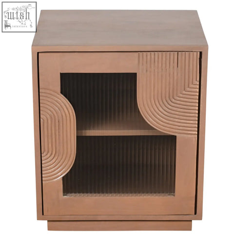Copper-finished jodhpur solid wood bedside table with geometrically carved panels and ribbed glass doors in pale taupe finish