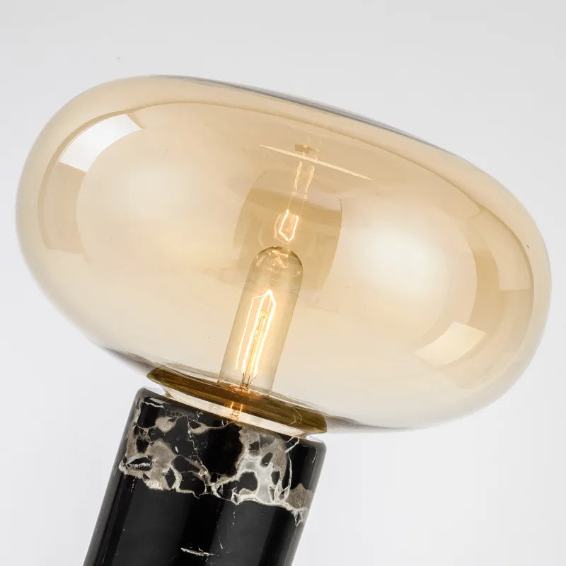 Johano Light amber glass lamp with black marble base and gold metal accents for stylish home lighting
