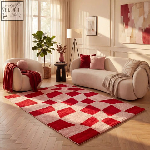 A soft textured plush red and cream geometric rug perfect for cozy spaces called joli checkered red pink rug