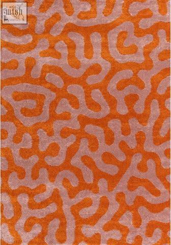 Joli doodle orange pink rug with plush textured surface and coral inspired pattern in orange and dusty rose colors
