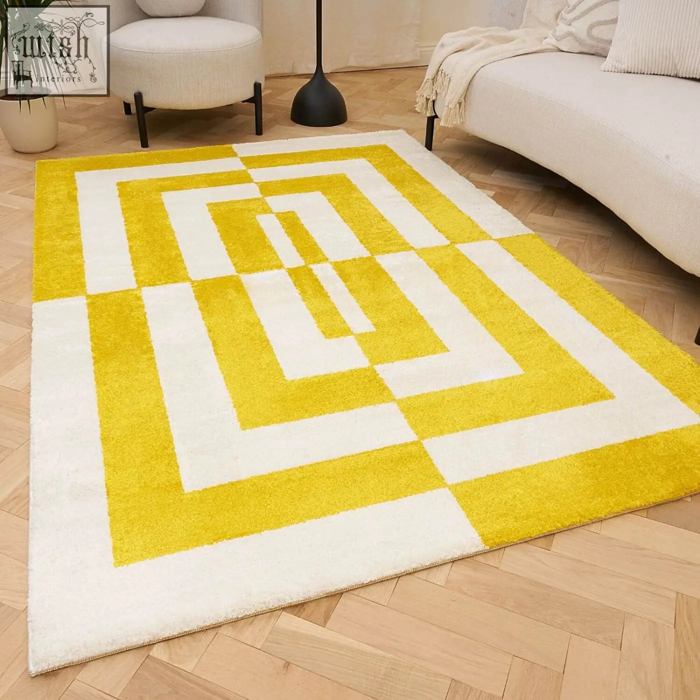 A vibrant joli geometric yellow and white area rug with a plush soft texture perfect for cozy living spaces