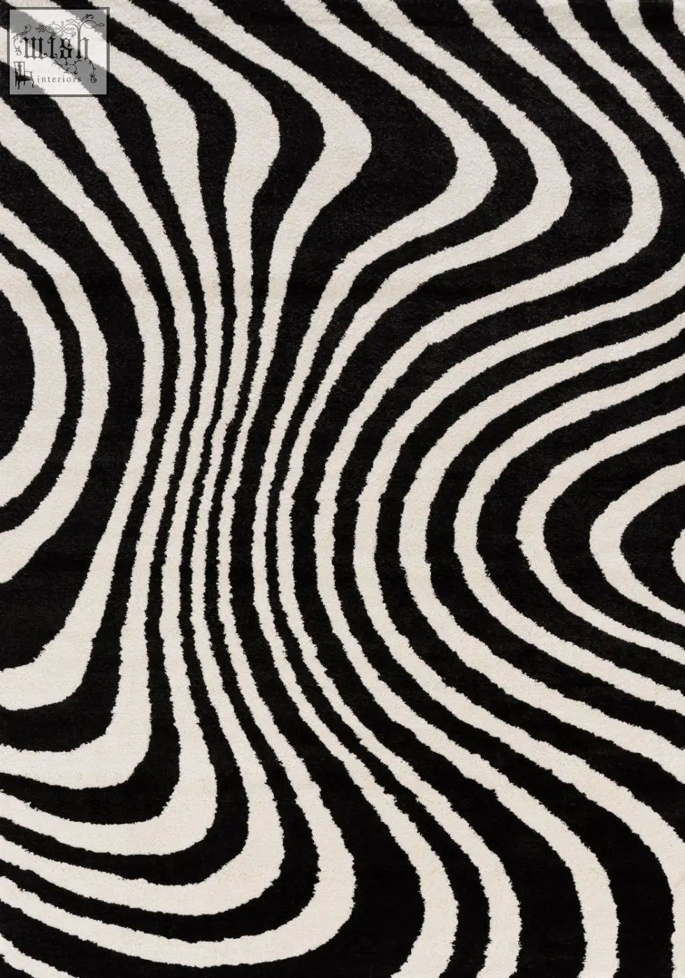 Plush shaggy joli striped black and white area rug with zebra stripes perfect for cozy modern rooms