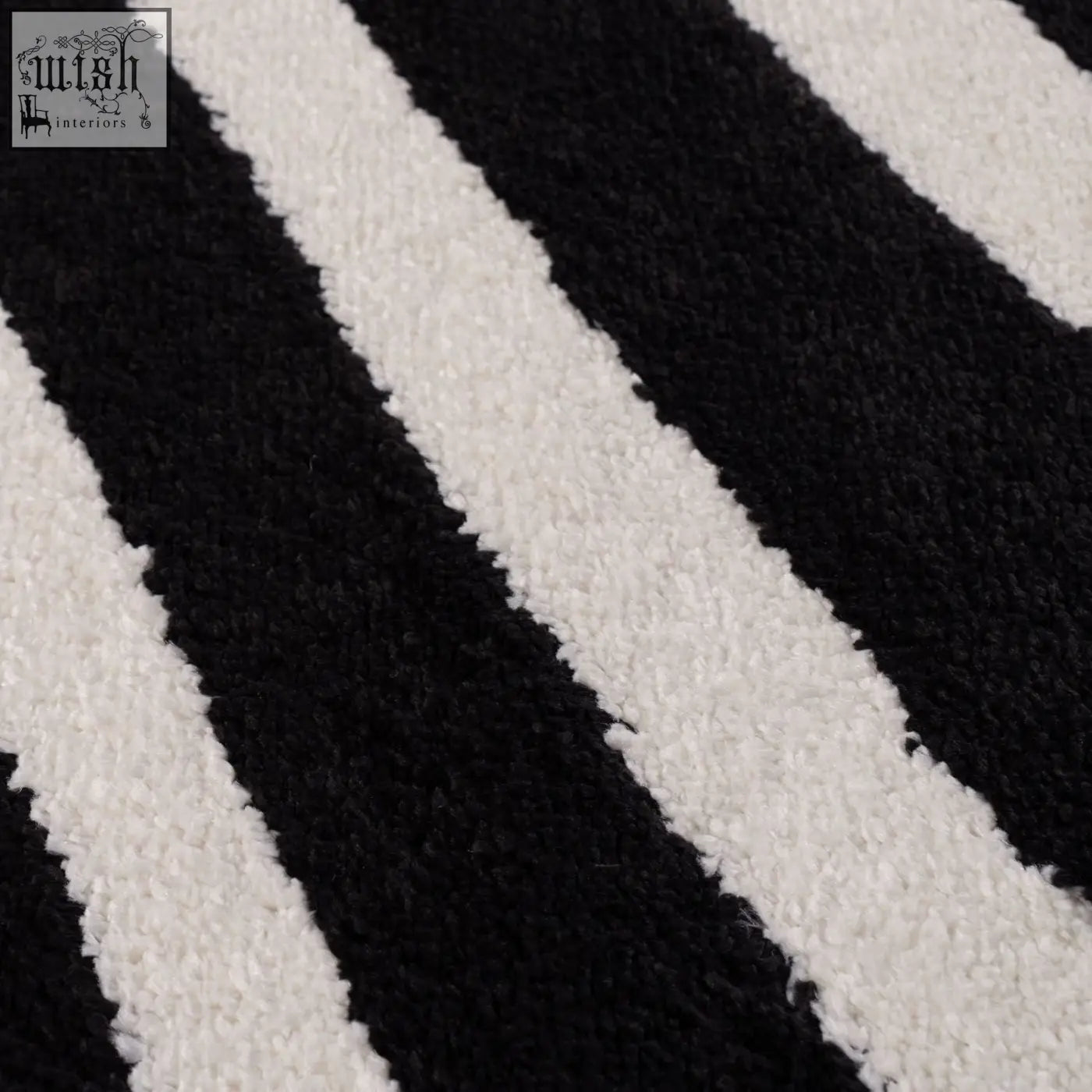 Soft textured joli striped black and white plush rug with bold stripes perfect for cozy living spaces