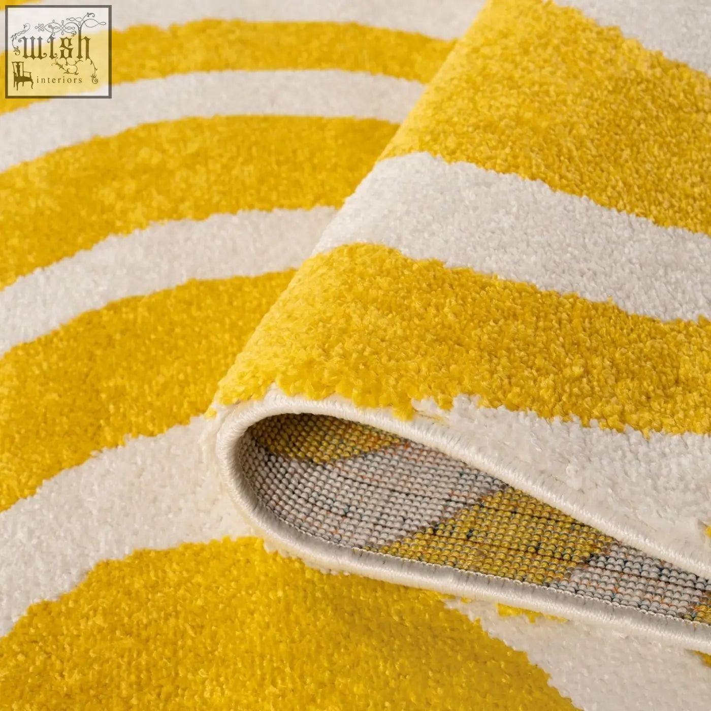 A soft textured joli striped yellow and white area rug perfect for cozy living spaces