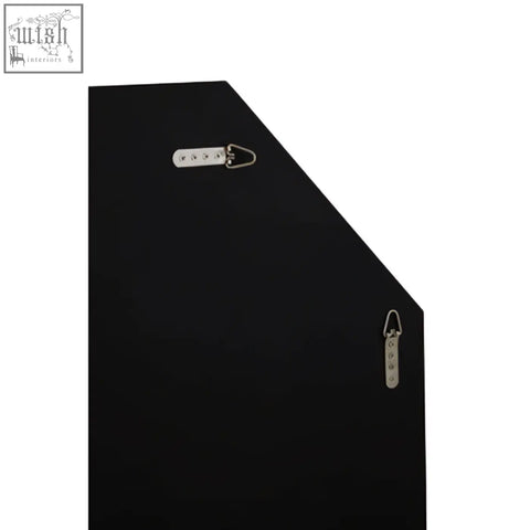 Black rectangular picture frame with silver hanging hardware on the back of josie silver octagon wall mirror