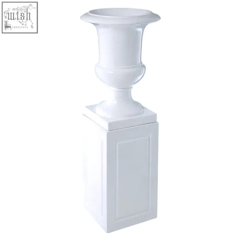 Josten white planter is a white ceramic urn with classical design flared rim and ornate detailing on its body