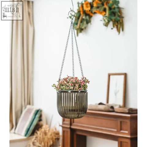 Josteve 6.5 inch dark ribbed glass hanging planter with visible water level and black metal chains for indoor use