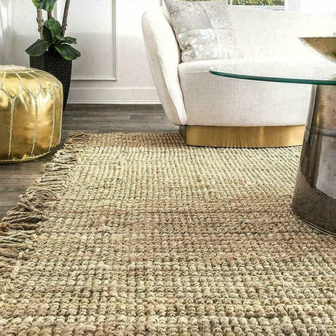 Natural fiber joto rug with a textured woven pattern and fringed edges perfect for cozy living spaces