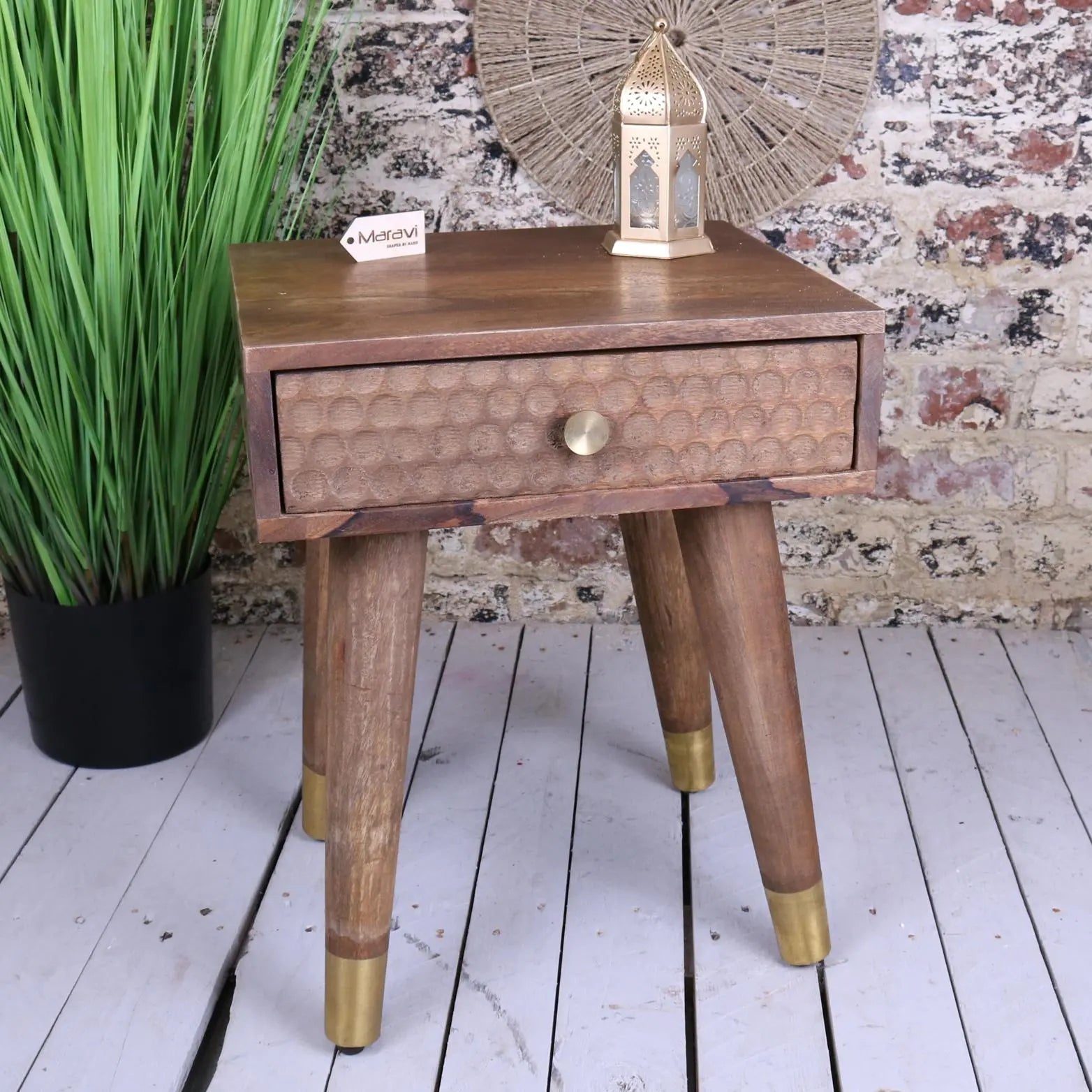 Wooden joypur mango wood bedside cabinet with honey-toned finish and brass accents on legs for stylish storage