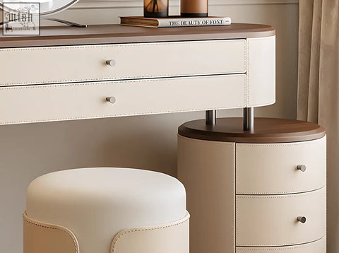 Cream-colored leather dressing table with dark wood top and curved edges offering ample surface space and low shipping cost