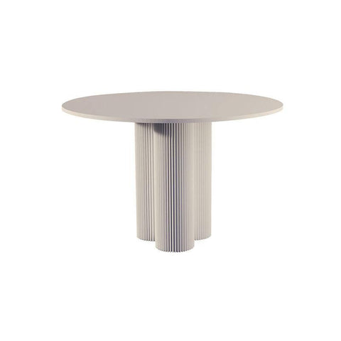 Julia round dining table with a smooth light gray top and ribbed column base in a neutral tone perfect for modern spaces