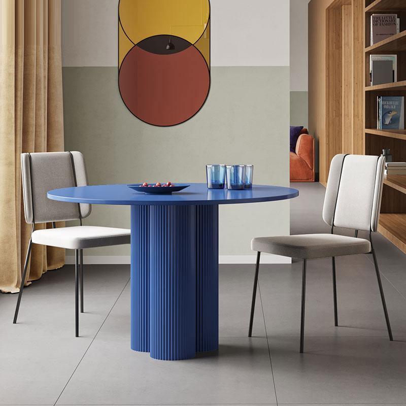 Vibrant blue julia round dining table with a fluted pedestal base perfect for stylish round dining spaces