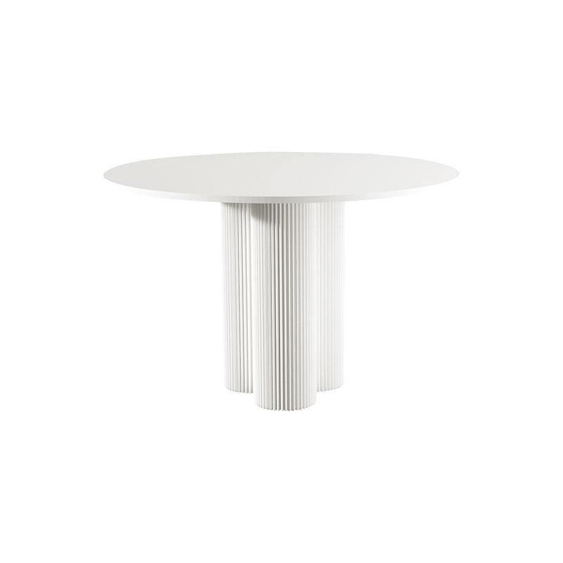 White julia round dining table with sleek minimalist design and vertical fluted legs perfect for round dining table setups