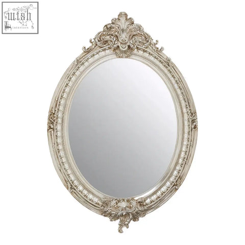 Antique-style juliet champagne oval framed wall mirror with ornate silver gold detailing and elegant design