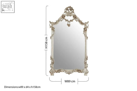 Antique-style juliet rectangular framed wall mirror with silver floral and scrollwork detailing in metal frame