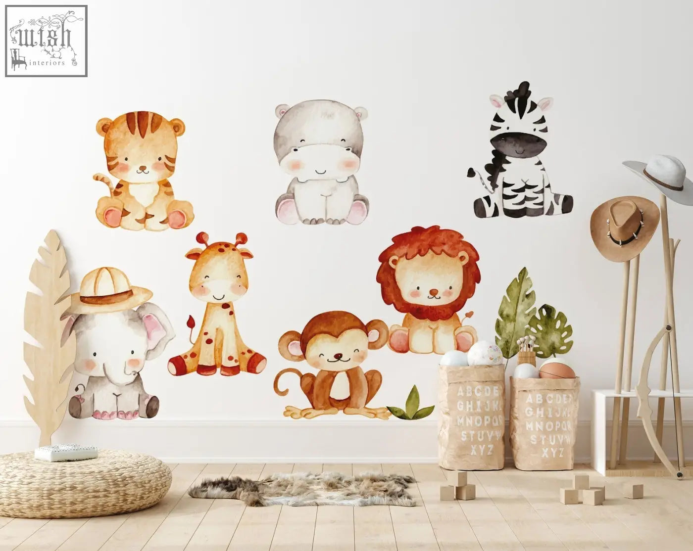 Watercolor-style jungle wall decals featuring tiger hippo zebra giraffe lion monkey and elephant in soft earthy tones