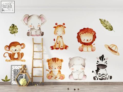Watercolor-style jungle wall decals in soft beige brown and cream with gentle brushstrokes for kids room decor