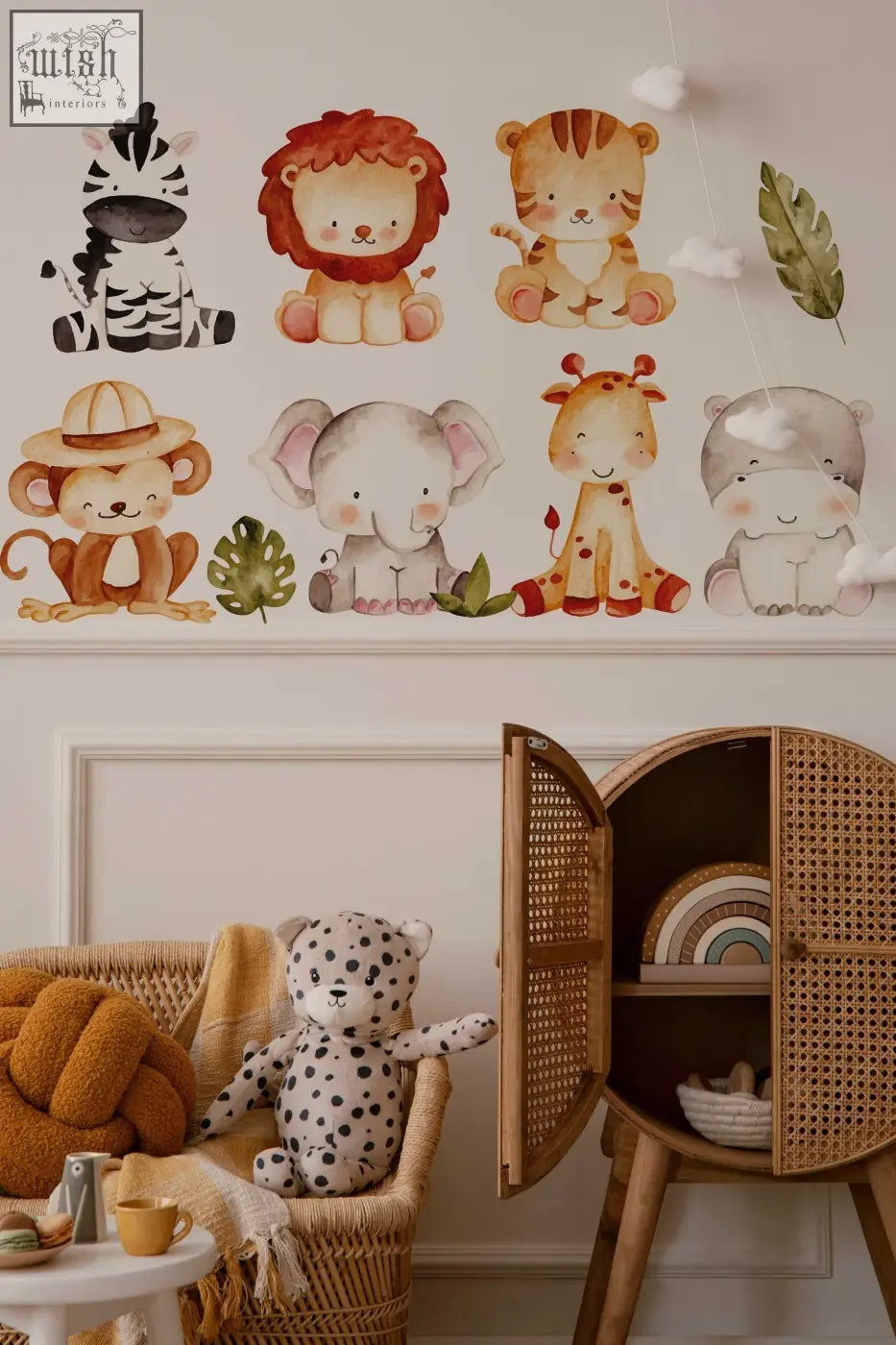 A charming set of reusable pastel jungle wall decals featuring zebra lion tiger monkey elephant giraffe and hippo for kids room