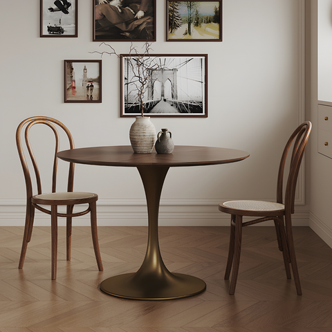 Bronze finished justina small round dining table with smooth top and elegant curved legs solid wood design