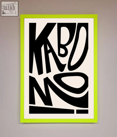 A bold black abstract typography kaboom framed print in a vibrant lime green frame perfect for modern decor