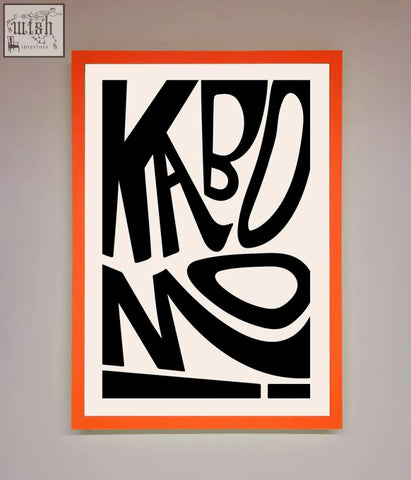 A bold orange-framed kaboom framed print with black stylized lettering on a white background perfect for wall decor