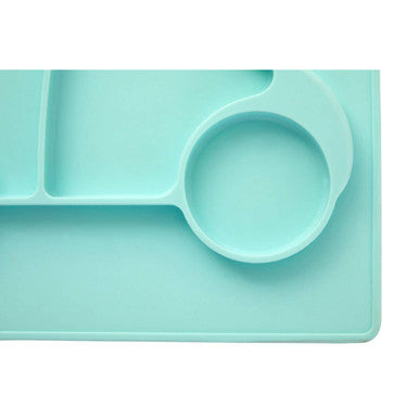 A mint green kai silicone divided food plate in car shape with circular spoon holder and rectangular compartments