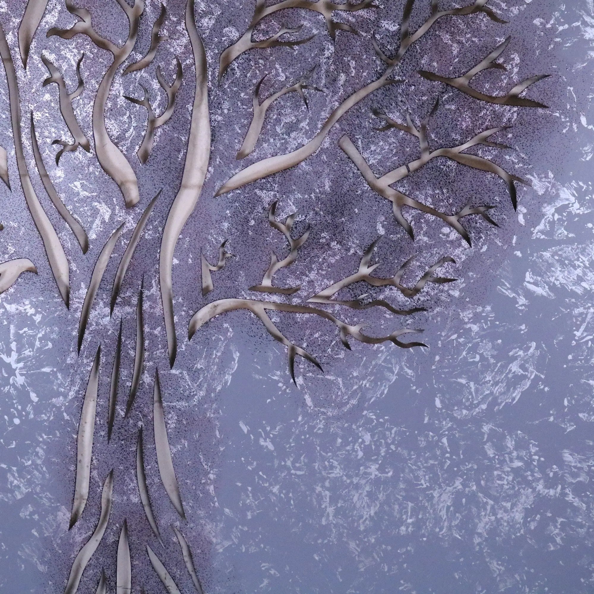Silver-toned metal garden wall art tree sculpture with intricate branches against purple gray textured background