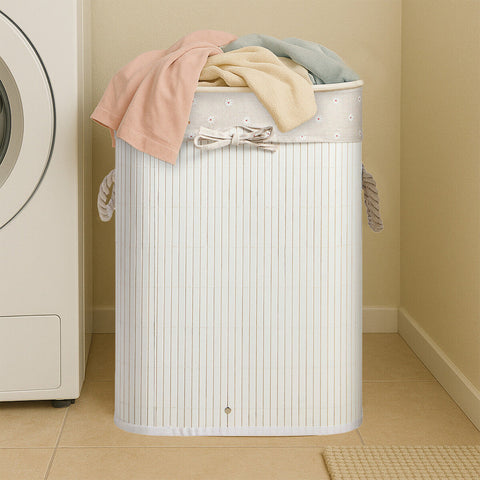 White square kankyo laundry hamper with vertical ribbed texture rope handles and decorative bow at the top rim