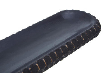 Black textured grip handle with ergonomic ribbed design on kara black mango wood serving dish