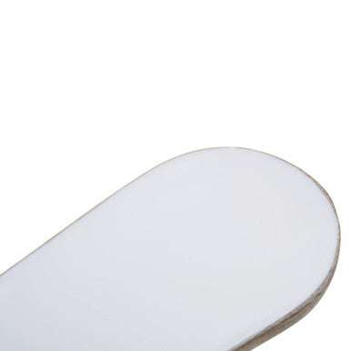 White smooth-edged skateboard deck with glossy finish shown alongside kara mango wood small oval serving dish