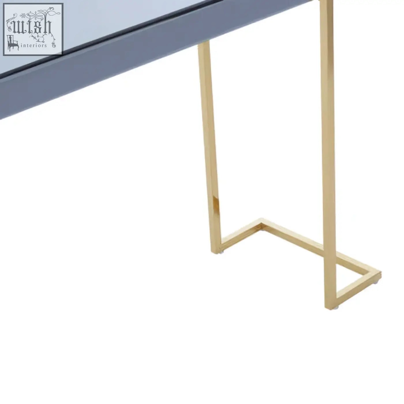 Kaso console table with gold toned stainless steel legs and a sleek grey console table surface