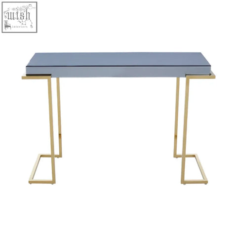 Modern kaso console table with a sleek matte grey top and slender gold-tone stainless steel legs