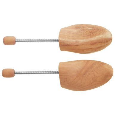 Light brown cedar wood men shoe shapers with metal rod and rounded ends for maintaining shoe shape