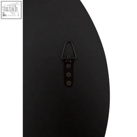 Black matte katelyn silver rounded wall mirror with minimalist hook and three decorative rivets for easy hanging