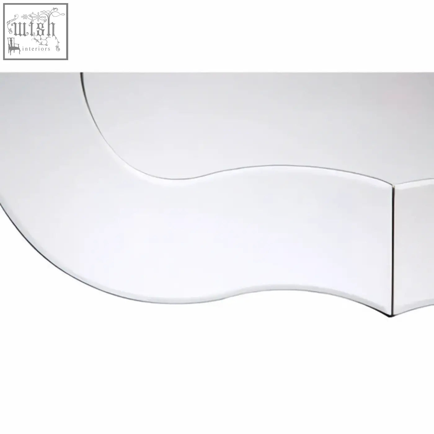 Curved mirrored console table with sleek modern design and clean lines paired with katelyn silver rounded wall mirror