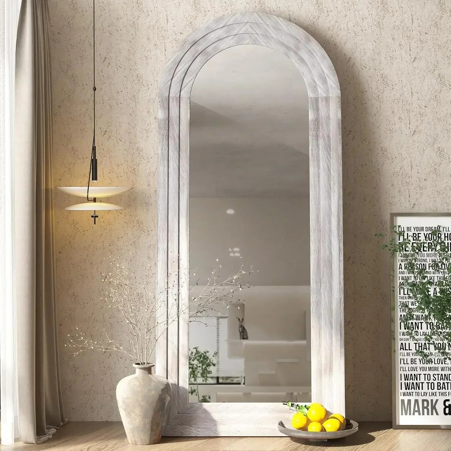 White arched kayo mirror with a marble like frame perfect for adding elegance to any room wall decor
