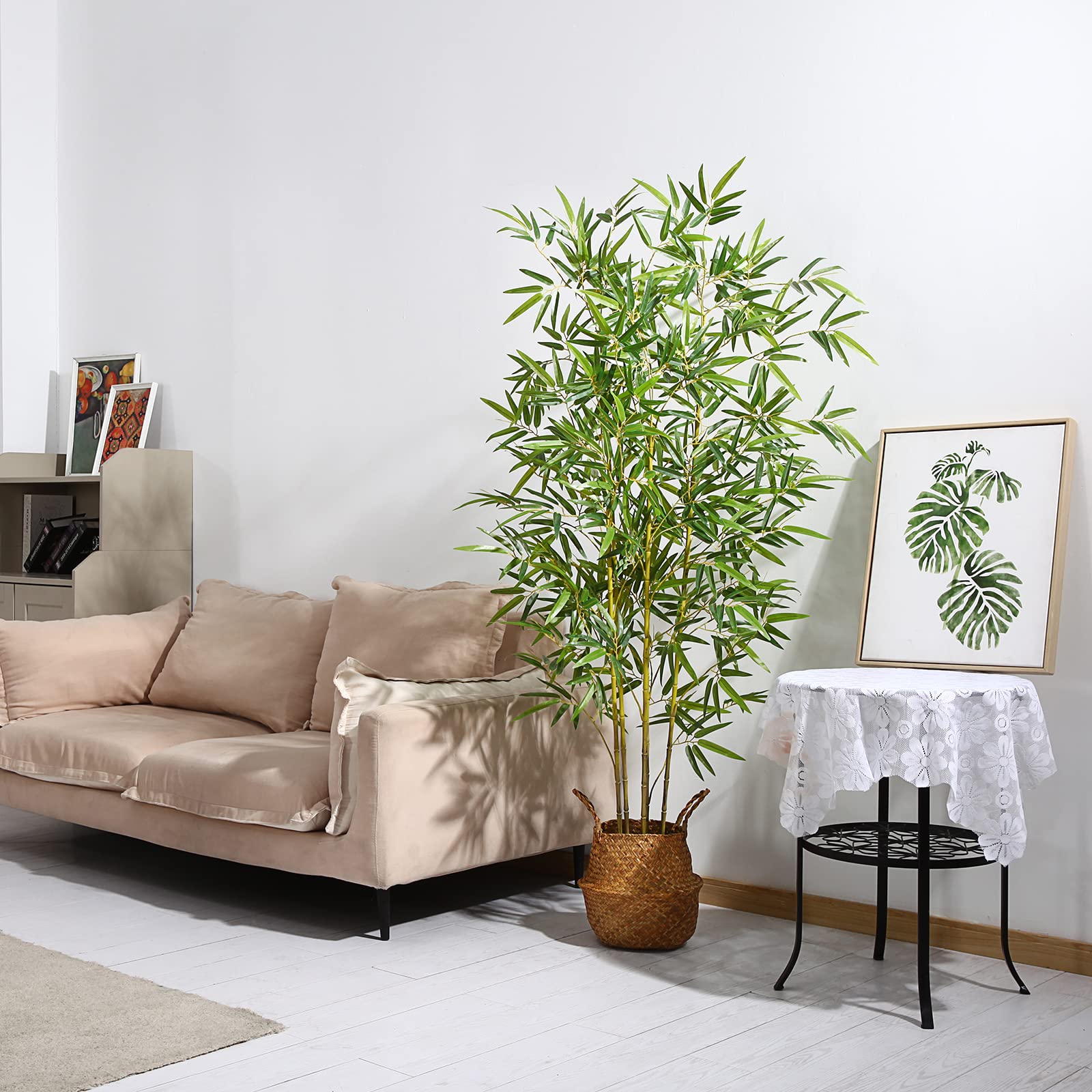 Tall artificial bamboo tree with lush green leaves and yellow stems in a woven wicker basket perfect for indoor use