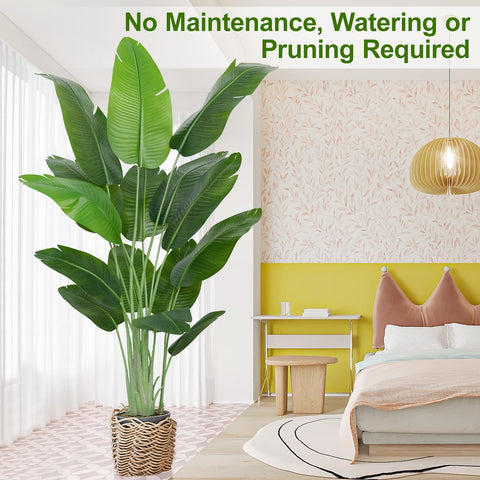 Tall vibrant green artificial bird of paradise plant banana tree with 15 leaves in a woven wicker basket pot