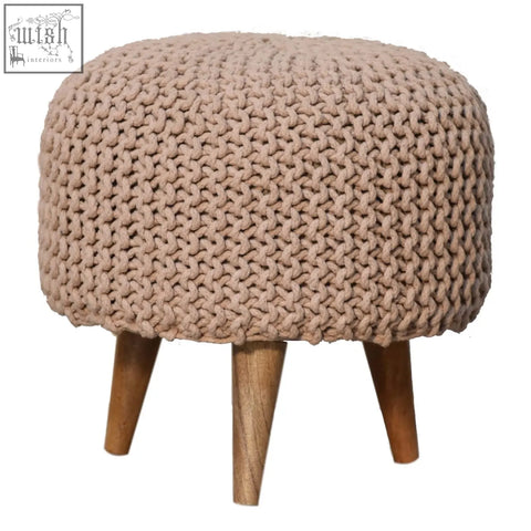 Keeva beige round footstool in beige fabric with knitted texture and wooden legs perfect for cozy seating