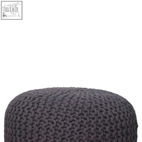 Dark grey knitted keeva grey round footstool with chunky texture and solid mango wood base for comfy seating