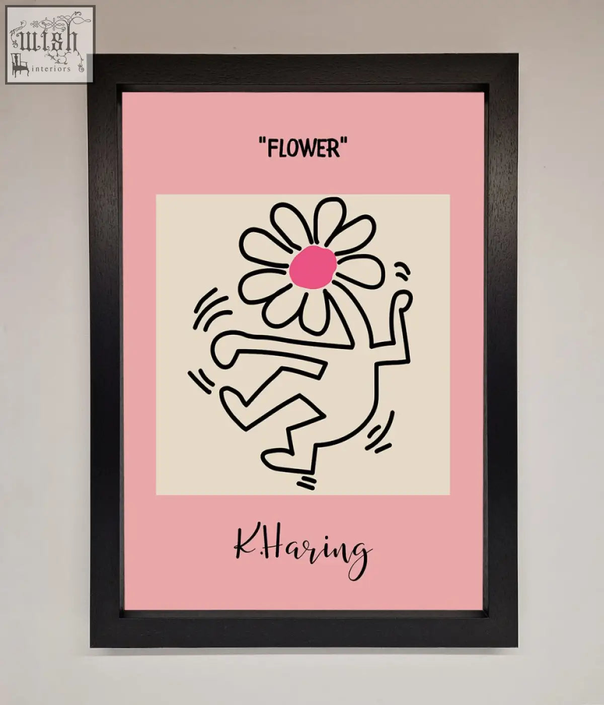 Pink framed poster featuring a keith haring flower black line drawing with pink center signed by k haring