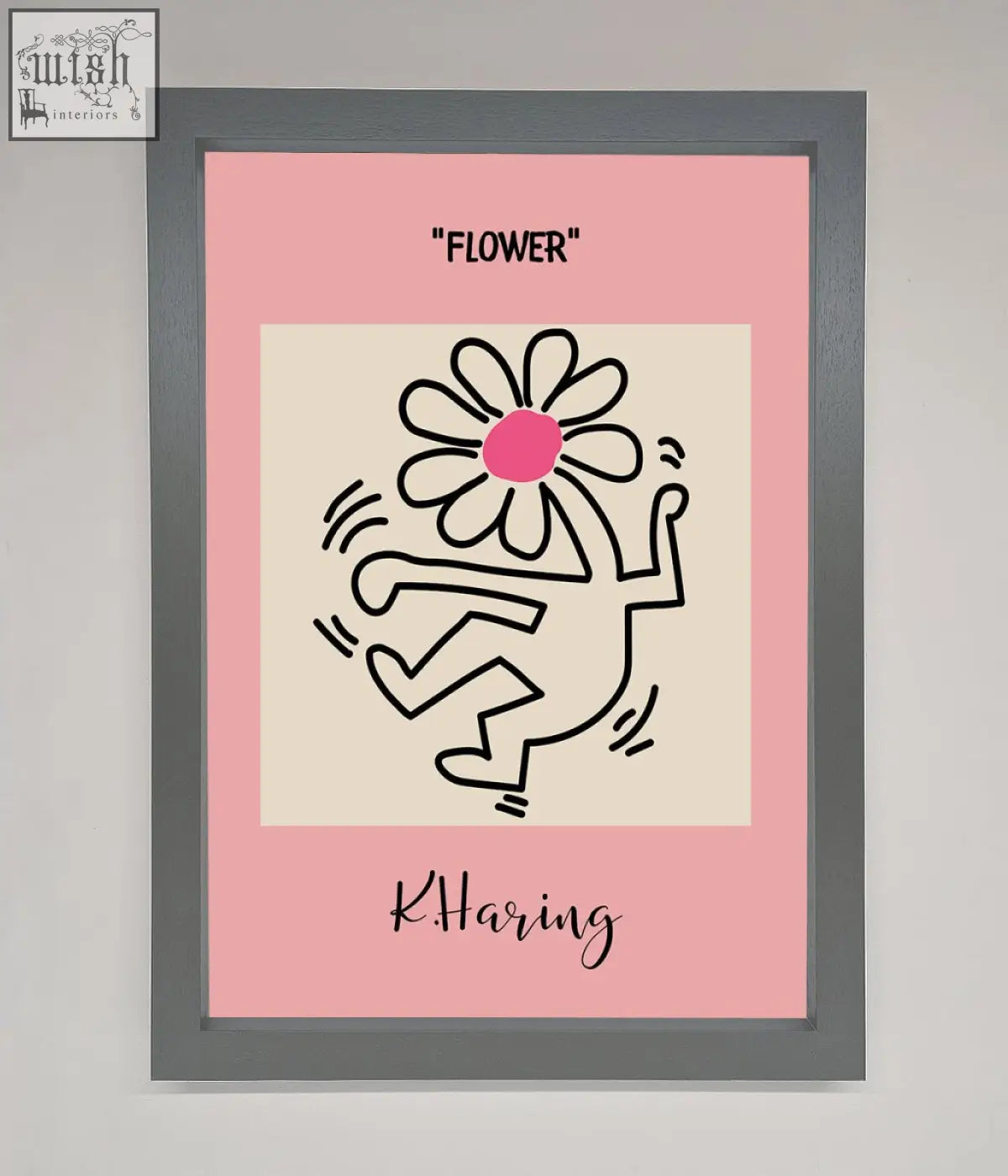 Framed poster of keith haring flower with black line art dancer and pink flower on cream background with pink mat