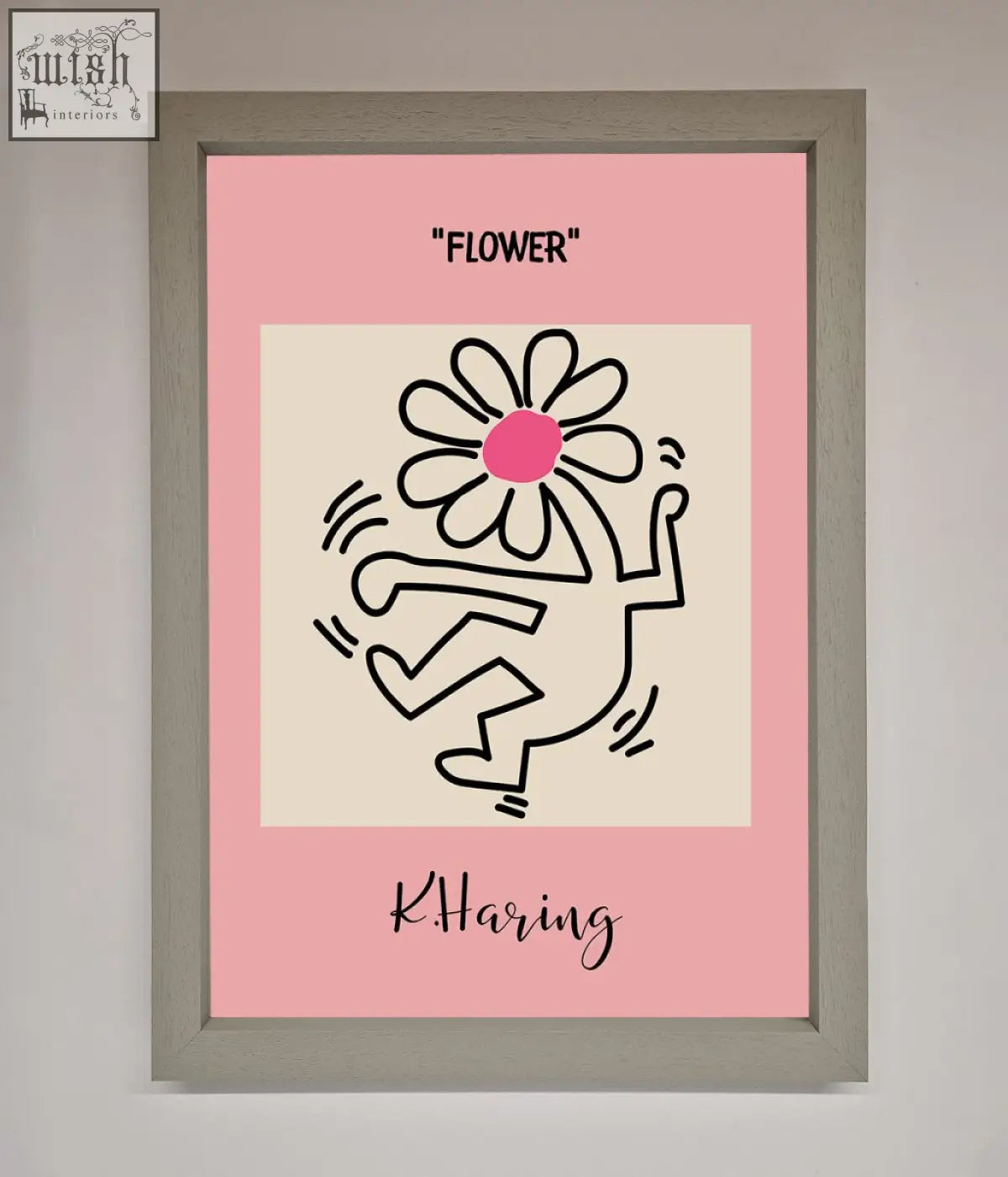 A framed poster featuring a keith haring flower pink design with a black line dancing figure on soft pink background