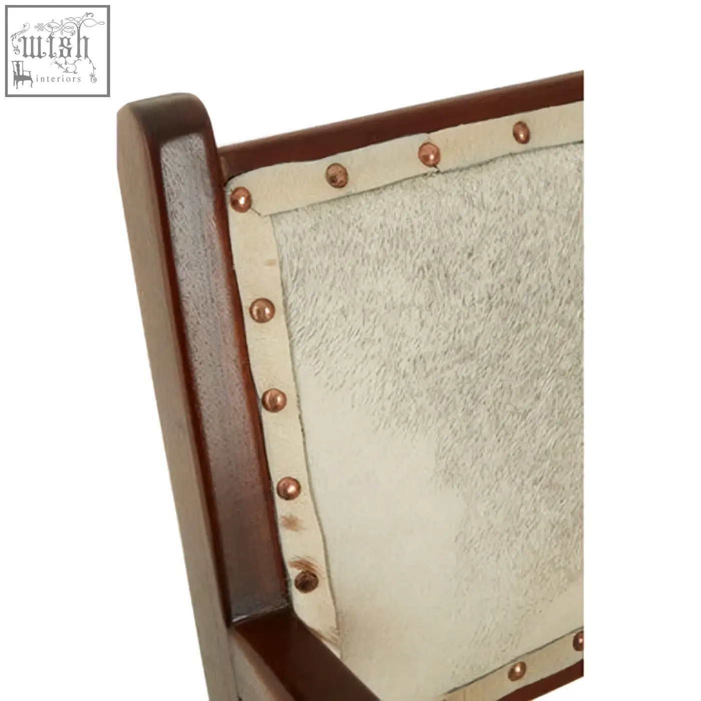 The kendari leather and teak wood dining chair features a dark teak wood frame with off-white textured upholstery and copper nailhead trim
