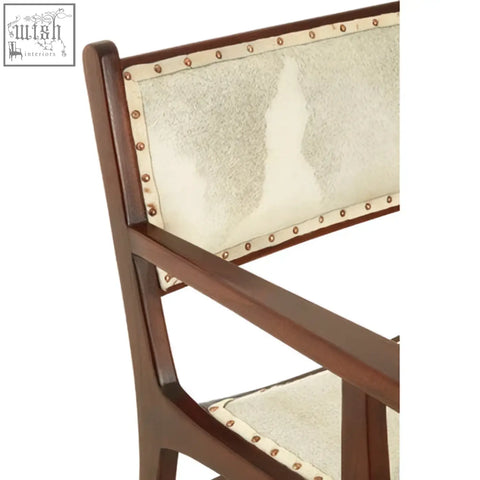 Kendari leather and teak wood dining chair with cream textured fabric and brass nailhead trim wood dining chair