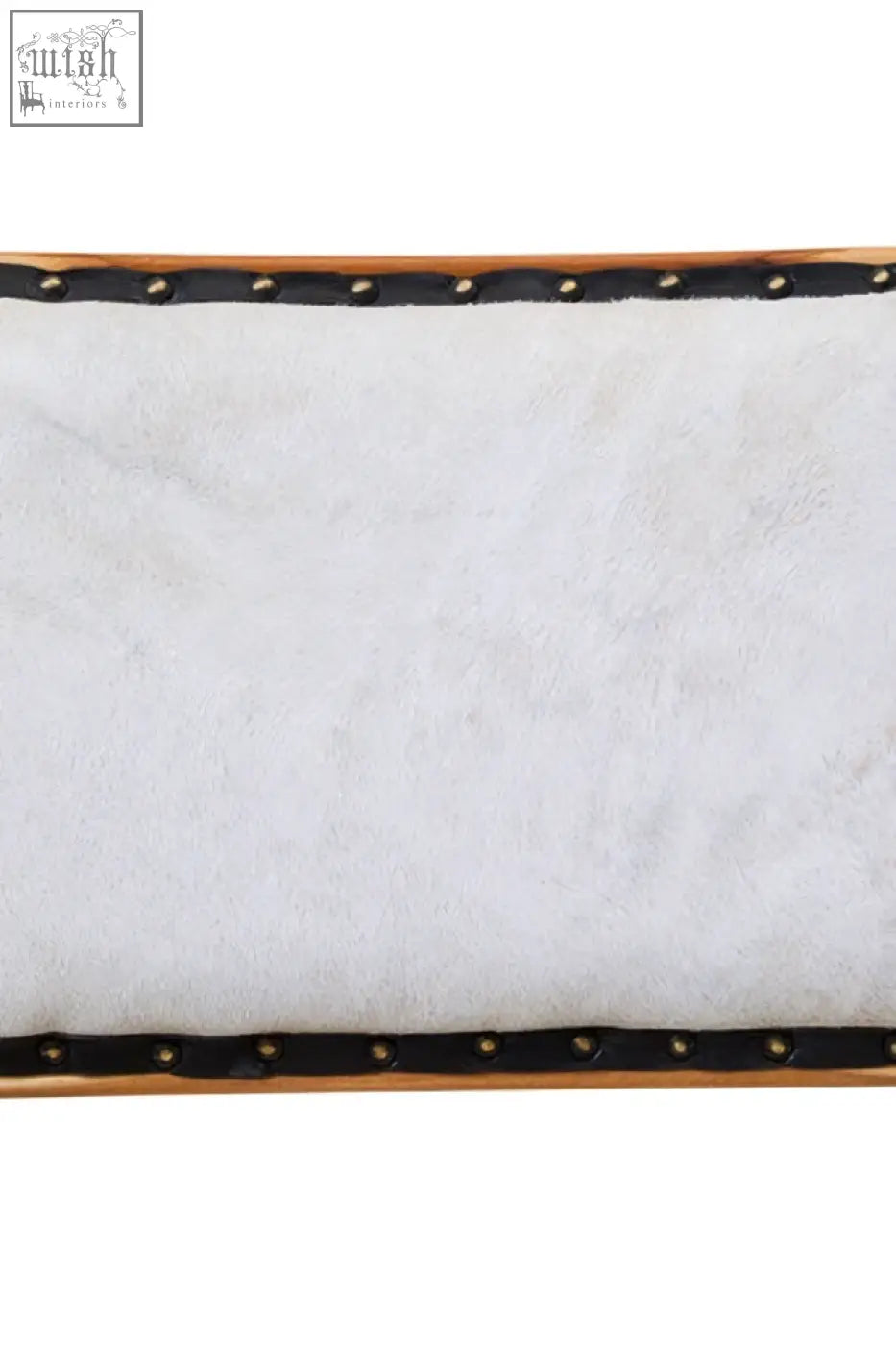White faux fur rectangular tray with black studded edges and teak wood frame perfect for kendari natural leather dining setups