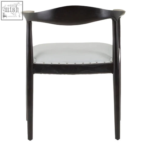 Black lacquered kendari open back grey leather chair with curved backrest and white upholstered seat