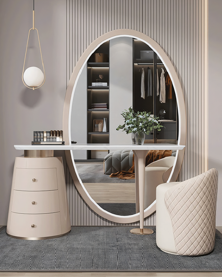 Oval-shaped mirror with sleek light beige frame and reflective surface for kendrick dressing table setup