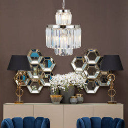 A kensington townhouse 6 bulbs pendant light with a chrome finish and cascading hexagonal glass prisms chandelier