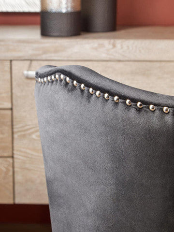 Back of kensington townhouse black dining chair with grey velvet and silver nailhead trim detail